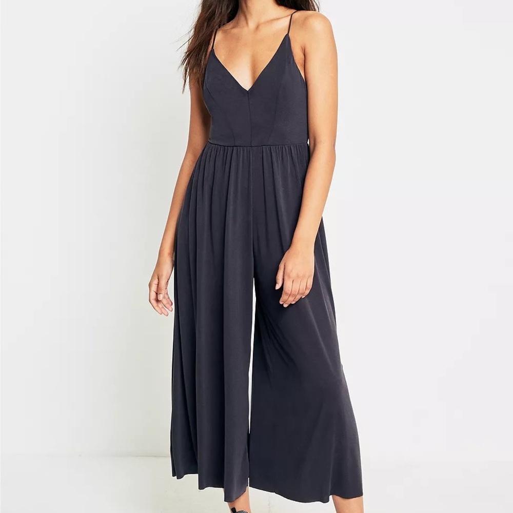 Plum Jumpsuit with Deep V-Neck and Flowing Wide Legs